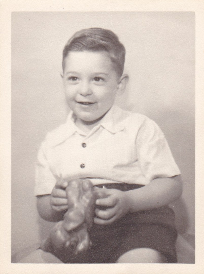 Peter as toddler with toy.jpg